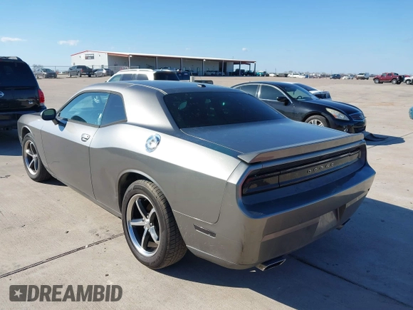 2012 Dodge Challenger SXT Plus with VIN 2C3CDYAG1CH262352, listed as a IAAI auction lot 41662002 with 141,868 mi miles. Bid and sale history available at carsss.com. Image 3.