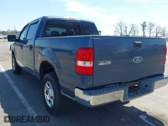 2004 Ford F-150 XLT with VIN 1FTRW14W24KA27415, listed as a IAAI auction lot 42081888 with 149,897 mi miles. Bid and sale history available at carsss.com. Image 3.