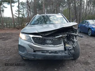 2012 Kia Sorento LX with VIN 5XYKTDA23CG243663, listed as a IAAI auction lot 41160965 with 113,317 mi miles. Bid and sale history available at carsss.com. Image 6.