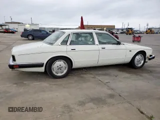 1994 Jaguar XJ with VIN SAJKX1743RC698636, listed as a Copart auction lot 56376685 with 192,928 mi miles and Salvage title. Bid and sale history available at DreamBid. Image 3.