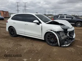 2016 Porsche Cayenne GTS with VIN WP1AD2A27GLA76553, listed as a Copart auction lot 53569615 with 69,761 mi miles and Salvage title. Bid and sale history available at DreamBid. Image 4.