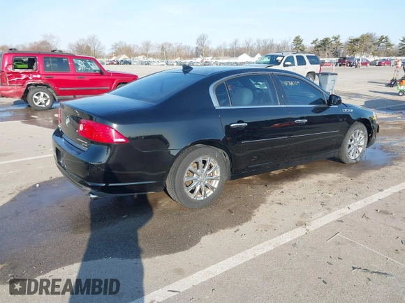 2011 Buick Lucerne CXL Premium with VIN 1G4HJ5EM0BU113687, listed as a IAAI auction lot 41768709 with 74,026 mi miles. Bid and sale history available at carsss.com. Image 4.