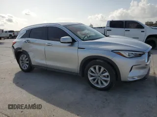 2019 Infiniti QX50 Luxe with VIN 3PCAJ5M19KF123138, listed as a Copart auction lot 61367315 with 117,826 mi miles and Salvage title. Bid and sale history available at DreamBid. Image 4.