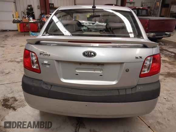 2009 Kia Rio LX with VIN KNADE223596444133, listed as a IAAI auction lot 41598865 with Not Provided miles and . Bid and sale history available at DreamBid. Image 16.