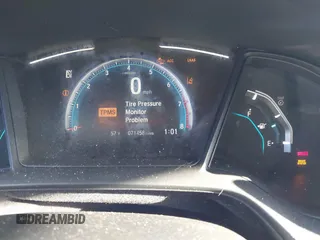 2020 Honda Civic LX with VIN 19XFC2F63LE004953, listed as a IAAI auction lot 41824922 with 71,458 mi miles and . Bid and sale history available at DreamBid. Image 7.