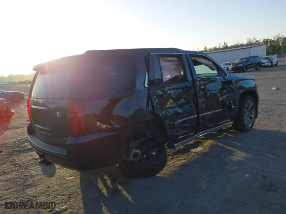 2018 Chevrolet Tahoe LT with VIN 1GNSCBKC1JR365875, listed as a IAAI auction lot 41584072 with 61,957 mi miles. Bid and sale history available at carsss.com. Image 4.