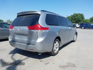 2014 Toyota Sienna LE AAS with VIN 5TDKK3DC4ES447265, listed as a IAAI auction lot 42024631 with 112,890 mi miles and . Bid and sale history available at carsss.com. Image 4.
