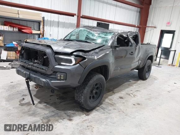 2021 Toyota Tacoma SR with VIN 3TYRX5GN8MT011370, listed as a IAAI auction lot 41287330 with 73,447 mi miles and . Bid and sale history available at DreamBid. Image 17.