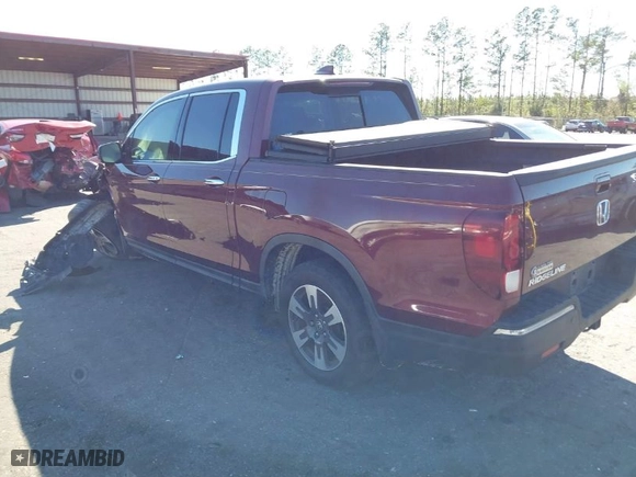 2019 Honda Ridgeline RTL-E with VIN 5FPYK3F72KB024461, listed as a IAAI auction lot 41813568 with 122,364 mi miles. Bid and sale history available at carsss.com. Image 3.