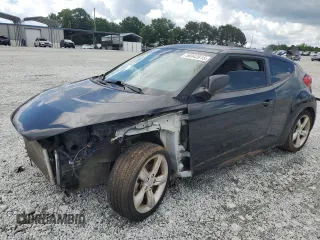 2014 Hyundai Veloster z VIN KMHTC6AD3EU198500, wystawiony jako Copart lot #56943915 z przebiegiem 118 173 mil mil oraz Tytuł czysty. Historia ofert i sprzedaży dostępna na DreamBid. Obrazek 1.