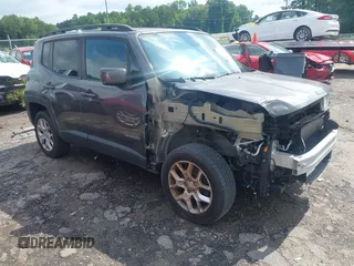 2017 Jeep Renegade Latitude with VIN ZACCJBBB2HPE49710, listed as a IAAI auction lot 42473831 with 57,114 mi miles and . Bid and sale history available at DreamBid. Image 1.