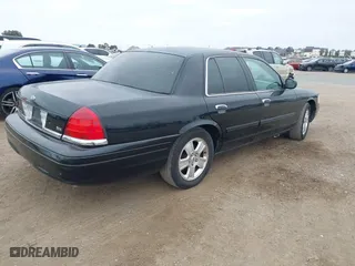 2011 Ford Crown Victoria LX with VIN 2FABP7EV0BX147267, listed as a IAAI auction lot 42052728 with 177,034 mi miles. Bid and sale history available at carsss.com. Image 4.