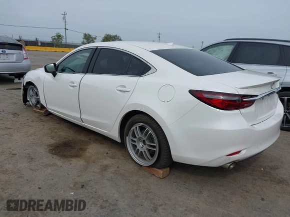 2018 Mazda 6 Grand Touring Reserve with VIN JM1GL1WYXJ1300116, listed as a IAAI auction lot 42088015 with 57,760 mi miles and . Bid and sale history available at DreamBid. Image 3.