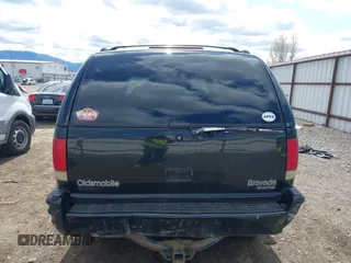 1997 Oldsmobile Bravada z VIN 1GHDT13W3V2707243, wystawiony jako IAAI lot #42024114 z przebiegiem 185 219 mil mil oraz . Historia ofert i sprzedaży dostępna na DreamBid. Obrazek 16.