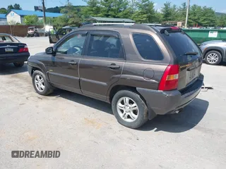 2005 Kia Sportage LX with VIN KNDJE723957075445, listed as a IAAI auction lot 42573760 with 185,000 mi miles and . Bid and sale history available at DreamBid. Image 3.