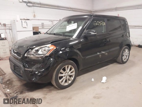 2012 Kia Soul + with VIN KNDJT2A60C7457882, listed as a IAAI auction lot 42050050 with 153,560 mi miles. Bid and sale history available at carsss.com. Image 2.
