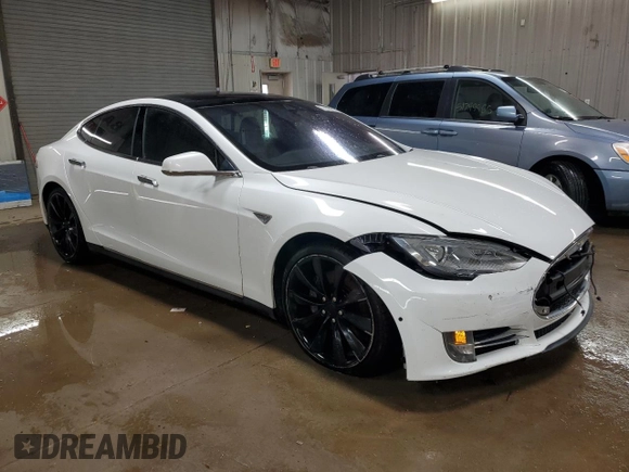 2015 Tesla Model S 85D with VIN 5YJSA1H24FF092628, listed as a Copart auction lot 51959035 with 128,744 mi miles and Salvage Title. Bid and sale history available at carsss.com. Image 4.