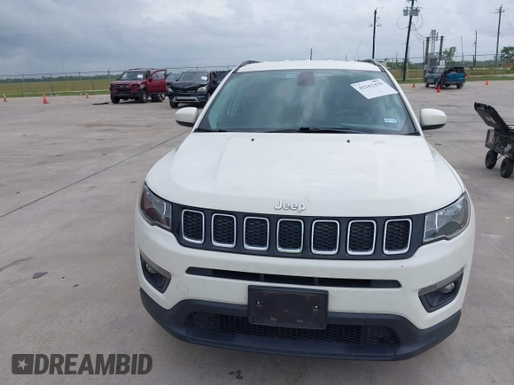 2019 Jeep Compass Latitude with VIN 3C4NJCBB9KT652088, listed as a IAAI auction lot 42162439 with 97,276 mi miles and . Bid and sale history available at DreamBid. Image 12.