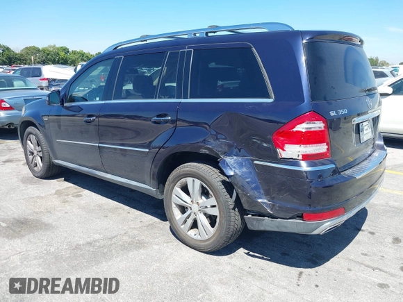 2012 Mercedes-Benz GL 350 with VIN 4JGBF2FEXCA776247, listed as a IAAI auction lot 41837519 with 119,421 mi miles and . Bid and sale history available at DreamBid. Image 3.