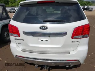 2012 Kia Sorento SX z VIN 5XYKWDA23CG231228, wystawiony jako IAAI lot #42366536 z przebiegiem 154 627 mil mil oraz . Historia ofert i sprzedaży dostępna na DreamBid. Obrazek 16.