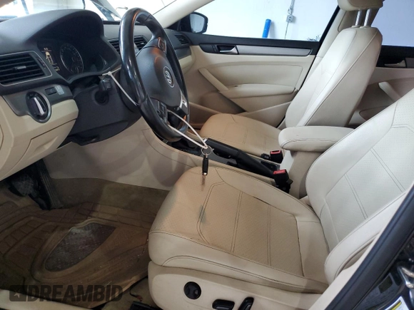 2015 Volkswagen Passat SE with VIN 1VWBV7A33FC043196, listed as a Copart auction lot 56210725 with 136,342 mi miles and Salvage title. Bid and sale history available at DreamBid. Image 7.