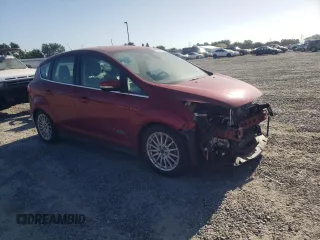 2015 Ford C-Max Energi SEL with VIN 1FADP5CUXFL115971, listed as a Copart auction lot 58272974 with 122,906 mi miles. Bid and sale history available at carsss.com. Image 4.