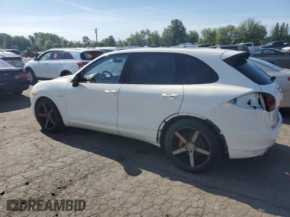 2012 Porsche Cayenne S Hybrid with VIN WP1AE2A25CLA90443, listed as a Copart auction lot 60108595 with 141,595 mi miles and Clean title. Bid and sale history available at DreamBid. Image 2.