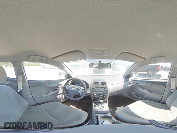 2010 Toyota Corolla with VIN 2T1BU4EE2AC329301, listed as a Copart auction lot 52970705 with 197,823 mi miles and Salvage Title. Bid and sale history available at DreamBid. Image 12.