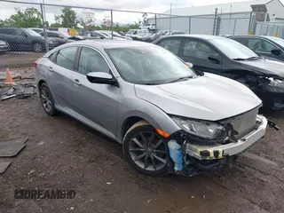 2019 Honda Civic EX-L z VIN 19XFC1F70KE000277, wystawiony jako IAAI lot #42322930 z przebiegiem 84 366 mil mil oraz . Historia ofert i sprzedaży dostępna na DreamBid. Obrazek 1.