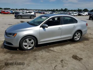 2012 Volkswagen Jetta TDI w/Premium & Nav z VIN 3VWLL7AJ9CM069918, wystawiony jako Copart lot #58237365 z przebiegiem 107 890 mil mil oraz Szkoda całkowita • Salvage title. Historia ofert i sprzedaży dostępna na DreamBid. Obrazek 1.