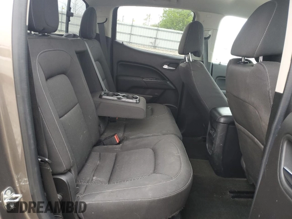2016 GMC Canyon 4WD SLE z VIN 1GTG6CE38G1303839, wystawiony jako Copart lot #57387295 z przebiegiem 87 945 mil mil oraz Nie do naprawy. Historia ofert i sprzedaży dostępna na DreamBid. Obrazek 10.