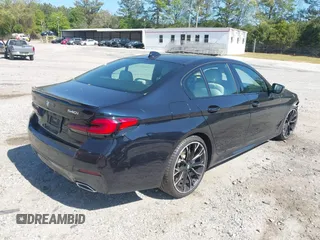 2021 BMW 5 Series 540i z VIN WBA53BJ04MWX00840, wystawiony jako IAAI lot #42056206 z przebiegiem 33 486 mil mil oraz . Historia ofert i sprzedaży dostępna na DreamBid. Obrazek 4.