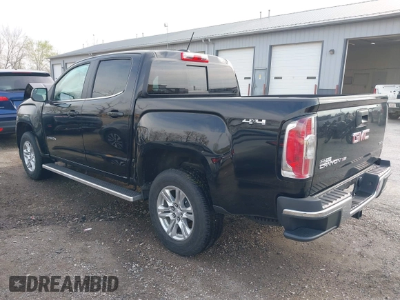 2019 GMC Canyon 4WD SLE z VIN 1GTG6CEN2K1354585, wystawiony jako IAAI lot #42014158 z przebiegiem 34 269 mil mil oraz . Historia ofert i sprzedaży dostępna na DreamBid. Obrazek 3.
