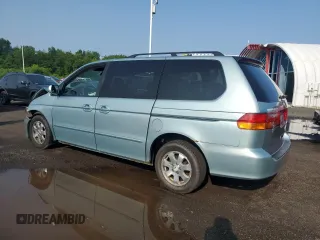 2003 Honda Odyssey EX-L с VIN 2HKRL18033H501741, выставлен на аукционе Copart как лот 60496865 с пробегом Не указан миль и Списание • Salvage title. История ставок и продаж доступна на DreamBid. Изображение 2.