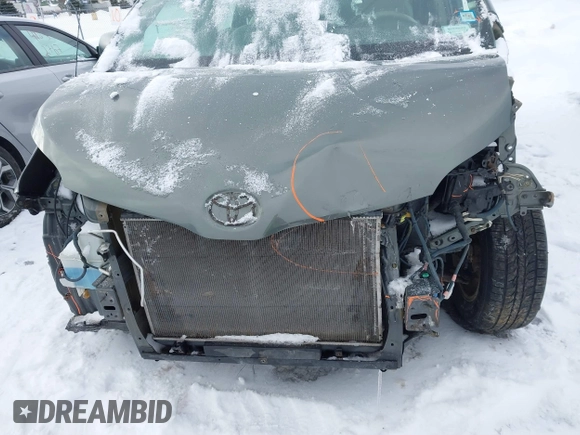2014 Toyota Sienna L with VIN 5TDZK3DC2ES429684, listed as a IAAI auction lot 41529309 with 112,190 mi miles. Bid and sale history available at carsss.com. Image 12.