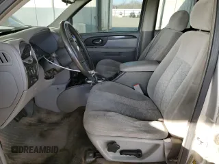 2005 GMC Envoy SLE with VIN 1GKDS13S852374516, listed as a Copart auction lot 42409725 with 299,816 mi miles and Salvage Title. Bid and sale history available at carsss.com. Image 7.