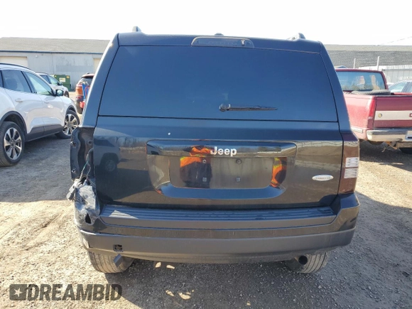 2014 Jeep Patriot Latitude with VIN 1C4NJPFB8ED850608, listed as a Copart auction lot 51276395 with 147,809 mi miles and Clean Title. Bid and sale history available at carsss.com. Image 6.