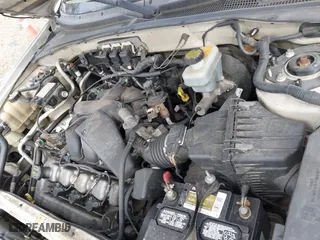 2005 Mercury Mariner Luxury with VIN 4M2CU57165DJ33059, listed as a IAAI auction lot 41675851 with 222,375 mi miles. Bid and sale history available at carsss.com. Image 10.