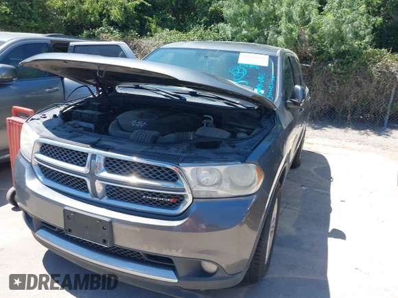 2013 Dodge Durango SXT z VIN 1C4RDHAG4DC512046, wystawiony jako IAAI lot #42826019 z przebiegiem 192 308 mil mil oraz . Historia ofert i sprzedaży dostępna na DreamBid. Obrazek 6.