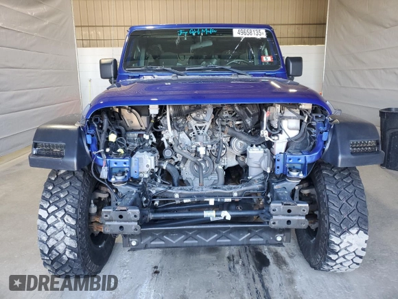 2020 Jeep Wrangler Unlimited Black and Tan with VIN 1C4HJXDG1LW267312, listed as a Copart auction lot 49658135 with 66,624 mi miles and Salvage title. Bid and sale history available at DreamBid. Image 5.