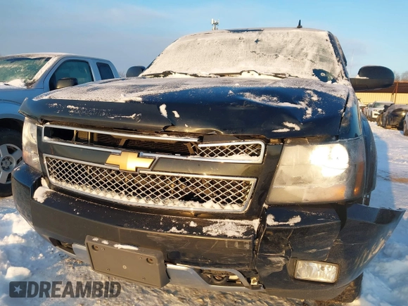 2012 Chevrolet Tahoe LT with VIN 1GNSKBE09CR295291, listed as a IAAI auction lot 41261810 with 133,400 mi miles and . Bid and sale history available at DreamBid. Image 6.