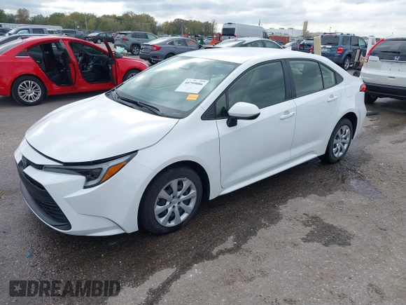 2023 Toyota Corolla Hybrid LE with VIN JTDBCMFE2P3007101, listed as a IAAI auction lot 40799086 with 13,974 mi miles. Bid and sale history available at carsss.com. Image 2.