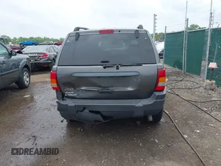 2003 Jeep Grand Cherokee Laredo z VIN 1J4GW48S73C545863, wystawiony jako IAAI lot #42222247 z przebiegiem 128 529 mil mil oraz . Historia ofert i sprzedaży dostępna na DreamBid. Obrazek 16.