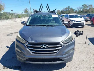 2017 Hyundai Tucson SE Plus with VIN KM8J33A45HU452928, listed as a IAAI auction lot 41601229 with 114,949 mi miles. Bid and sale history available at carsss.com. Image 12.