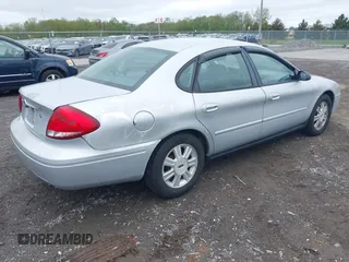 2005 Ford Taurus SEL z VIN 1FAFP56245A233415, wystawiony jako IAAI lot #42225619 z przebiegiem 145 658 mil mil oraz . Historia ofert i sprzedaży dostępna na DreamBid. Obrazek 4.