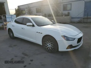2014 Maserati Ghibli z VIN ZAM57XSA6E1097525, wystawiony jako Copart lot #42029695 z przebiegiem 93 740 mil mil oraz Szkoda całkowita • Salvage title. Historia ofert i sprzedaży dostępna na DreamBid. Obrazek 4.