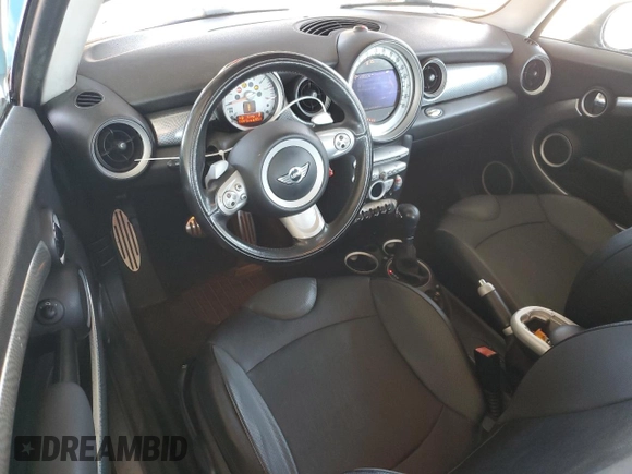 2007 MINI Hardtop S z VIN WMWMF73587TL91078, wystawiony jako Copart lot #65798545 z przebiegiem 118 513 mil mil oraz Czysty tytuł • Clean title. Historia ofert i sprzedaży dostępna na DreamBid. Obrazek 8.