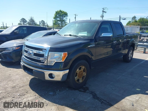 2014 Ford F-150 XL with VIN 1FTFW1CF5EKD93147, listed as a IAAI auction lot 42069973 with 277,140 mi miles. Bid and sale history available at carsss.com. Image 2.