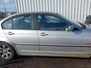 1999 BMW 3 Series 323i with VIN WBAAM3330XKC56332, listed as a IAAI auction lot 41200762 with 157,004 mi miles. Bid and sale history available at carsss.com. Image 13.