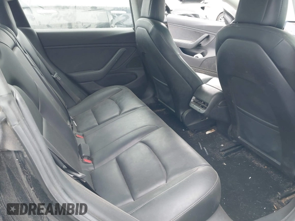 2019 Tesla Model 3 Mid Range with VIN 5YJ3E1EA2KF362048, listed as a IAAI auction lot 40141734 with 70,321 mi miles and . Bid and sale history available at carsss.com. Image 8.